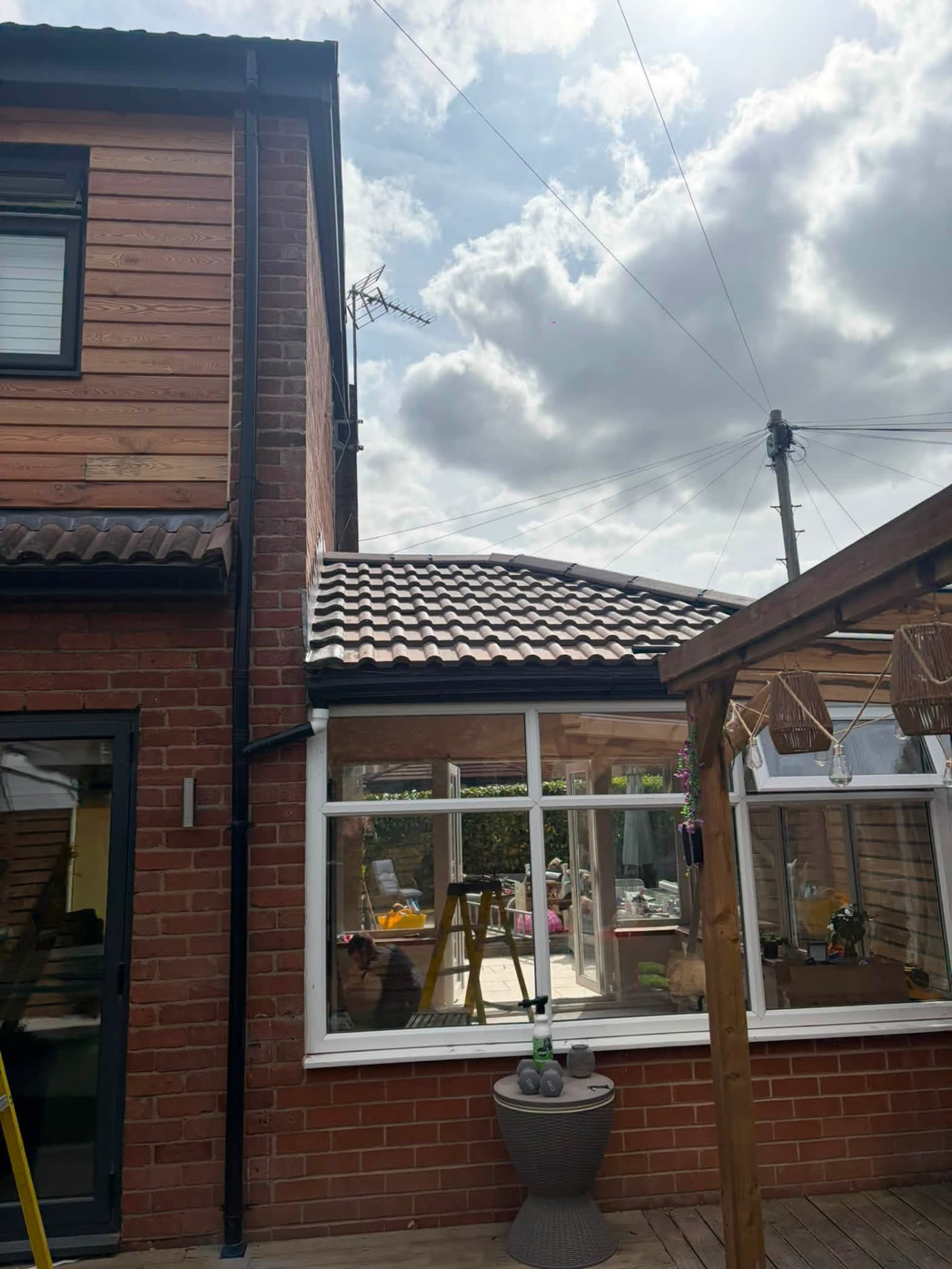 Tiled warm roof conversion fitted over a conservatory by MB Roofline & Joinery in the North West